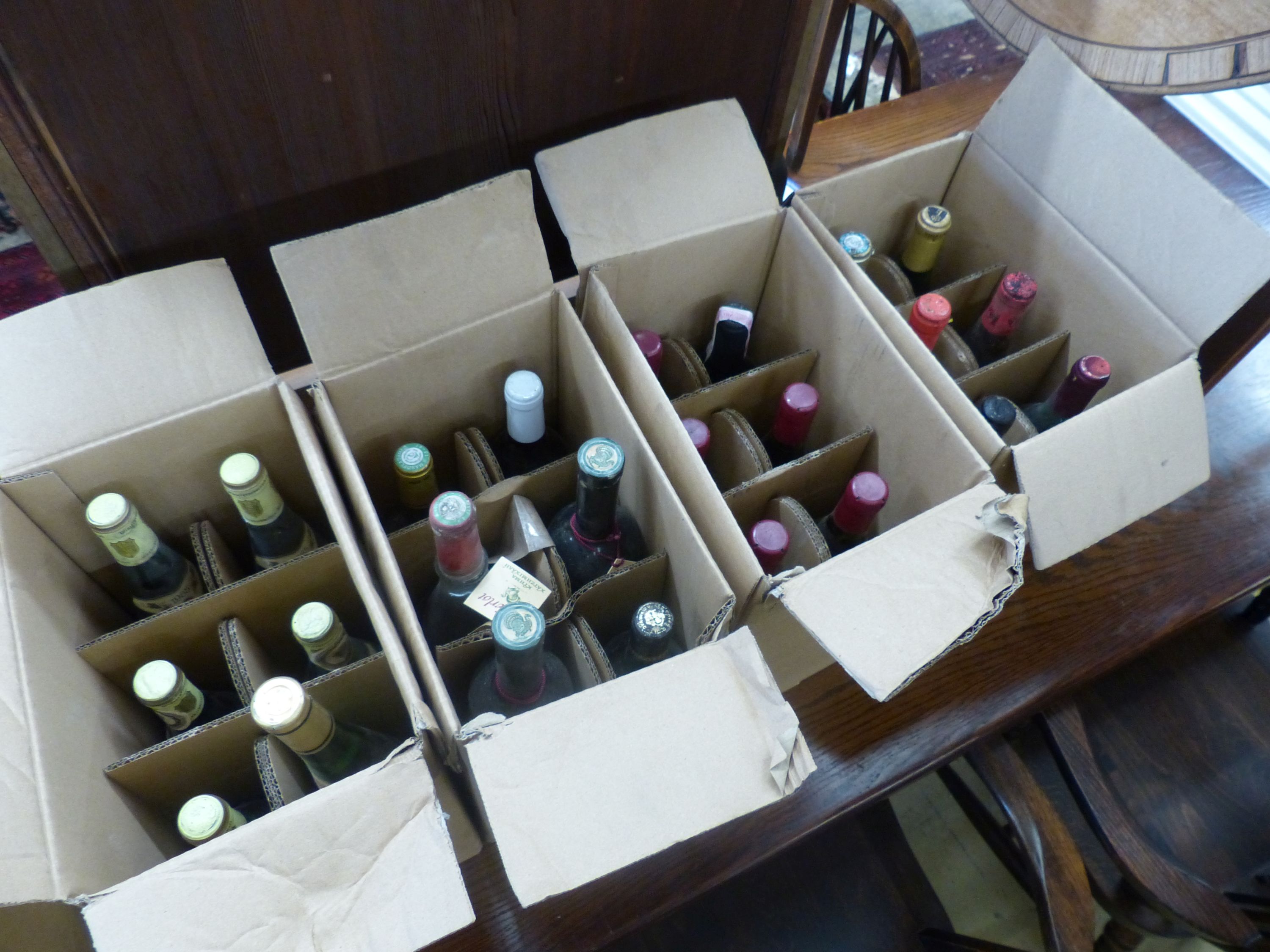 Approximately 74 bottles of assorted wines and spirits including Cahors 1978, Chateau du Cricastin 1979, etc.